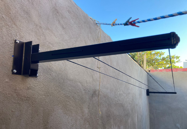 Tendedero plegable en patio