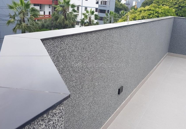 Granalla gris en muro de terraza